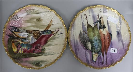 Two Limoges wall plaques, painted with dead hanging game